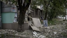 Последствия артиллерийского обстрела в Луганске. Архвиное фото Последствия артиллерийского обстрела в Луганске. Архвиное фото