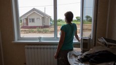 Cтроительство домов для пострадавших от паводка в Амурской области. Архивное фото Cтроительство домов для пострадавших от паводка в Амурской области. Архивное фото