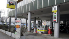 Заправочная станция компании Eni в Милане. Архивное фото Заправочная станция компании Eni в Милане. Архивное фото