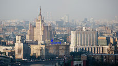 Дом правительства РФ и высотное здание на Кудринской площади. Архивное фото Дом правительства РФ и высотное здание на Кудринской площади. Архивное фото