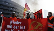 Акция протеста по случаю открытия во Франфурте-на-Майне нового офиса ЕЦБ Акция протеста по случаю открытия во Франфурте-на-Майне нового офиса ЕЦБ