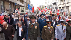 Петербуржцы пронесли портреты родных-ветеранов на марше Бессмертный полк Петербуржцы пронесли портреты родных-ветеранов на марше Бессмертный полк