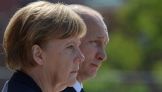 Президент Российской Федерации Владимир Путин и канцлер Федеративной Республики Германия Ангела Меркель. Архивное фото Президент Российской Федерации Владимир Путин и канцлер Федеративной Республики Германия Ангела Меркель. Архивное фото