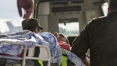 Пострадавший при обрушении казармы учебного центра ВДВ на окраине Омска. Архивное фото Пострадавший при обрушении казармы учебного центра ВДВ на окраине Омска. Архивное фото