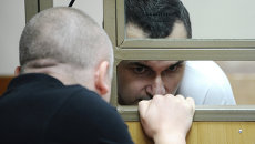 Первое слушание по уголовному делу в отношении украинского режиссера Олега Сенцова Первое слушание по уголовному делу в отношении украинского режиссера Олега Сенцова