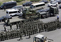 Военная полиция на месте взрывов на складе опасных веществ в промышленном городе Тяньцзинь в Китае Военная полиция на месте взрывов на складе опасных веществ в промышленном городе Тяньцзинь в Китае
