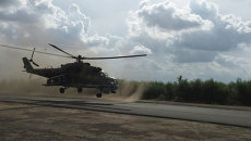 Российские ударные вертолеты МИ-24 вылетают на боевое задание с аэродрома Хмеймим, Сирия. Архивное фото Российские ударные вертолеты МИ-24 вылетают на боевое задание с аэродрома Хмеймим, Сирия. Архивное фото