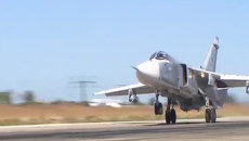 Момент сброса бомбы с российского самолета Су-24М на боевом вылете в Сирии Момент сброса бомбы с российского самолета Су-24М на боевом вылете в Сирии