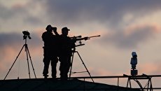 Сотрудники службы безопасности президента во время праздничных мероприятий, посвященных 70-летию Победы. Архивное фото Сотрудники службы безопасности президента во время праздничных мероприятий, посвященных 70-летию Победы. Архивное фото