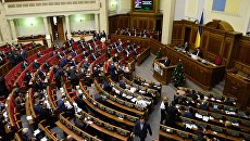 Депутаты и члены кабинета министров на заседании Верховной Рады Украины. Архивное фото Депутаты и члены кабинета министров на заседании Верховной Рады Украины. Архивное фото