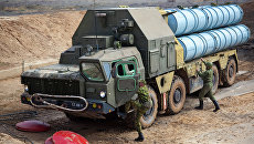 Разворачивание зенитно-ракетной системы С-300. Архивное фото Разворачивание зенитно-ракетной системы С-300. Архивное фото