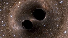 Кадр моделирования столкновения двух черных дыр в космосе Кадр моделирования столкновения двух черных дыр в космосе