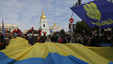 Активисты партии Свобода и Правого сектора во время демонстрации в Киеве, Украина. Архивное фото Активисты партии Свобода и Правого сектора во время демонстрации в Киеве, Украина. Архивное фото
