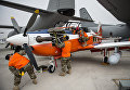 Самолет Peruvian KAI KT-1 на международном аэрокосмическом салоне Латинской Америки FIDAE в аэропорту Сантьяго Самолет Peruvian KAI KT-1 на международном аэрокосмическом салоне Латинской Америки FIDAE в аэропорту Сантьяго