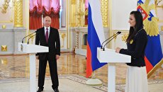 Президент РФ В. Путин встретился с российской олимпийской сборной в Кремле Президент РФ В. Путин встретился с российской олимпийской сборной в Кремле