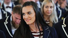 Двукратная олимпийская чемпионка Елена Исинбаева. Архивное фото Двукратная олимпийская чемпионка Елена Исинбаева. Архивное фото