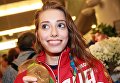 Спортсменка сборной России Вера Бирюкова во время церемонии встречи в аэропорту Шереметьево Спортсменка сборной России Вера Бирюкова во время церемонии встречи в аэропорту Шереметьево