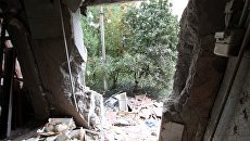Последствия обстрела Горловки. Архивное фото Последствия обстрела Горловки. Архивное фото