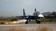 Российский истребитель Су-34 совершает взлет на авиабазе Хмеймим в Сирии. Архивное фото Российский истребитель Су-34 совершает взлет на авиабазе Хмеймим в Сирии. Архивное фото