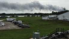 Дым со стороны пусковой платформы SpaceX на мысе Канаверал, Флорида, США. 1 сентября 2016 Дым со стороны пусковой платформы SpaceX на мысе Канаверал, Флорида, США. 1 сентября 2016