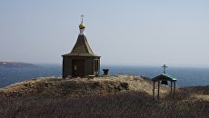 Остров Матуа из Курильской гряды. Архивное фото Остров Матуа из Курильской гряды. Архивное фото