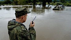 Военнослужащие 5-й общевойсковой армии РФ Восточного военного округа на плавающем транспортере. Архивное фото Военнослужащие 5-й общевойсковой армии РФ Восточного военного округа на плавающем транспортере. Архивное фото