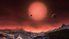 Так художник представил себе планету TRAPPIST-1d и ее две кузины Так художник представил себе планету TRAPPIST-1d и ее две кузины