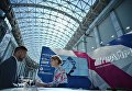 Посетитель на стенде агентства экономической информации Прайм на международном инвестиционном форуме Сочи 2016 Посетитель на стенде агентства экономической информации Прайм на международном инвестиционном форуме Сочи 2016