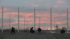 Беженцы в лагере во Франции. Архивное фото Беженцы в лагере во Франции. Архивное фото