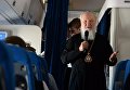 Патриарх Московский и всея Руси Кирилл в салоне самолета во время перелета из Бразилии в Россию Патриарх Московский и всея Руси Кирилл в салоне самолета во время перелета из Бразилии в Россию