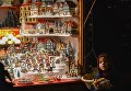 Ребенок во время открытия старейшей Рождественской ярмарки Штрицельмаркт в Дрездене Ребенок во время открытия старейшей Рождественской ярмарки Штрицельмаркт в Дрездене
