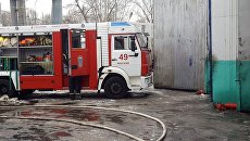 Тушение пожара. Архивное фото Тушение пожара. Архивное фото