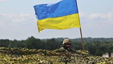 Украинский военный на учениях во Львовской области. Архивное фото Украинский военный на учениях во Львовской области. Архивное фото
