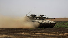 Израильские военные возле сектора Газа. Архивное фото Израильские военные возле сектора Газа. Архивное фото