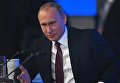 Президент РФ Владимир Путин на двенадцатой большой ежегодной пресс-конференции в Центре международной торговли на Красной Пресне. 23 декабря 2016 Президент РФ Владимир Путин на двенадцатой большой ежегодной пресс-конференции в Центре международной торговли на Красной Пресне. 23 декабря 2016