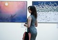 Посетительница на открытии IV фестиваля Первозданная Россия в Москве Посетительница на открытии IV фестиваля Первозданная Россия в Москве