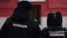 Сотрудники полиции на улице Москвы. Архивное фото Сотрудники полиции на улице Москвы. Архивное фото