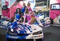 Модели на выставке Motorsport Expo в КВЦ Сокольники в Москве Модели на выставке Motorsport Expo в КВЦ Сокольники в Москве