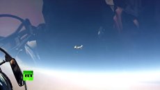 Минобороны России показало видео удара Ту-95МС по позициям ИГ под Раккой Минобороны России показало видео удара Ту-95МС по позициям ИГ под Раккой