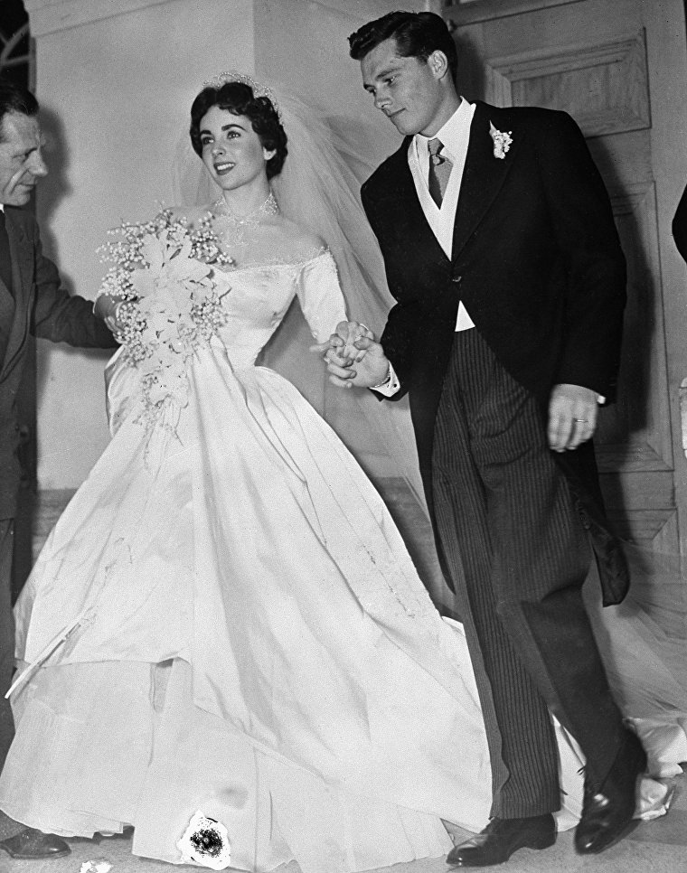 1-й брак актрисы Элизабет Тейлор с Конрадом Хилтоном-младшим, 6 мая 1950 1-й брак актрисы Элизабет Тейлор с Конрадом Хилтоном-младшим, 6 мая 1950