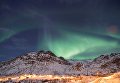 Северное сияние в небе над Унстадом, Норвегия Северное сияние в небе над Унстадом, Норвегия