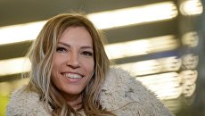 Певица Юлия Самойлова, представитель России на международном песенном конкурсе Евровидение-2017, в аэропорту Шереметьево Певица Юлия Самойлова, представитель России на международном песенном конкурсе Евровидение-2017, в аэропорту Шереметьево