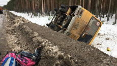 На месте ДТП со школьным автобусом в Лодейнопольском районе Ленинградской области. Архивное фото На месте ДТП со школьным автобусом в Лодейнопольском районе Ленинградской области. Архивное фото