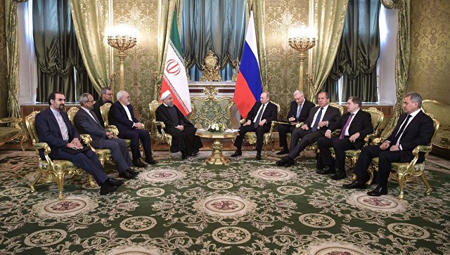 Президент РФ Владимир Путин и президент Исламской Республики Иран Хасан Рухани во время встречи в Москве. 28 марта 2017 года