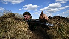 Военнослужащий во время совместных тактических учений подразделений ВДВ РФ и ССО ВС РБ. Архивное фото Военнослужащий во время совместных тактических учений подразделений ВДВ РФ и ССО ВС РБ. Архивное фото