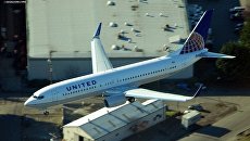 Самолет Boeing 737 компании United Airlines. Архивное фото Самолет Boeing 737 компании United Airlines. Архивное фото