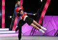 Спортсмены Дмитрий Самольянов и Оксана Павленко во время всероссийских соревнований по акробатическому рок-н-роллу Rock’n’Roll &CO. в Москве Спортсмены Дмитрий Самольянов и Оксана Павленко во время всероссийских соревнований по акробатическому рок-н-роллу Rock’n’Roll &CO. в Москве