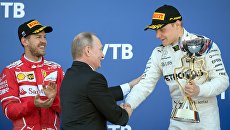 Президент РФ В. Путин посетил гонки российского этапа чемпионата мира Формулы-1 в Сочи Президент РФ В. Путин посетил гонки российского этапа чемпионата мира Формулы-1 в Сочи