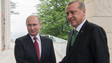 Президент РФ Владимир Путин и президент Турции Реджеп Тайип Эрдоган во время встречи в Сочи. 3 мая 2017 Президент РФ Владимир Путин и президент Турции Реджеп Тайип Эрдоган во время встречи в Сочи. 3 мая 2017