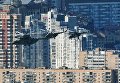 Тяжелый транспортный вертолет Ми-26 и многоцелевые вертолёты Ми-8 на репетиции воздушной части парада Победы в Москве Тяжелый транспортный вертолет Ми-26 и многоцелевые вертолёты Ми-8 на репетиции воздушной части парада Победы в Москве